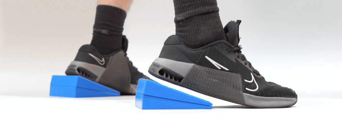 Beyond Mobility: Why Heel Elevation is the Key to Optimal Squat Mechanics - GymFit Tech